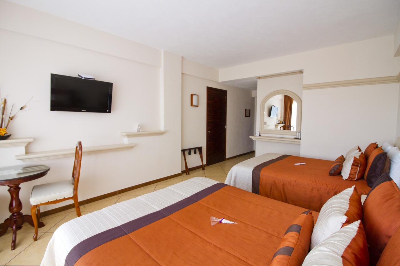 Hotel 9 Manantiales تشيغناهوابان المظهر الخارجي الصورة