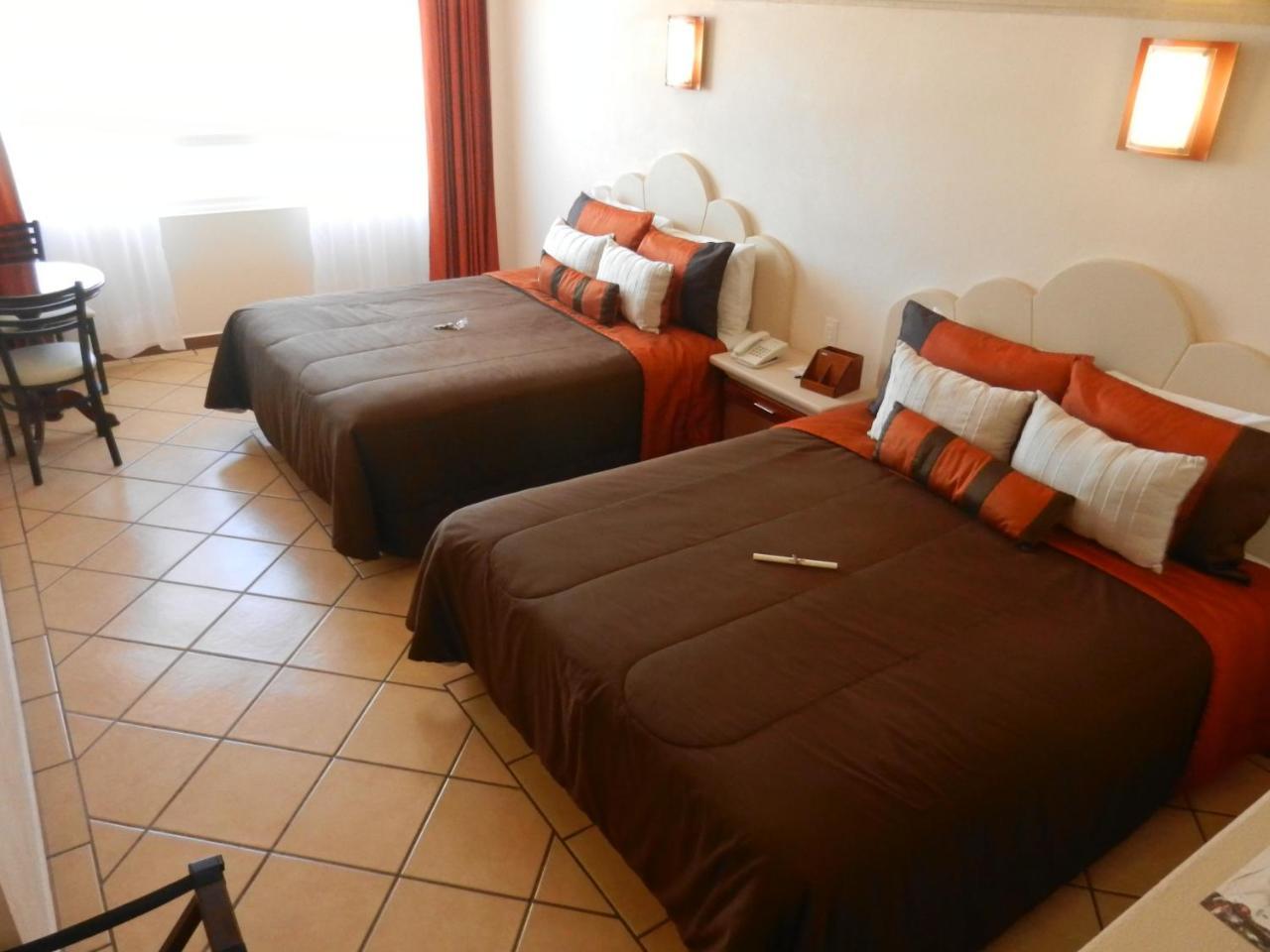 Hotel 9 Manantiales تشيغناهوابان المظهر الخارجي الصورة