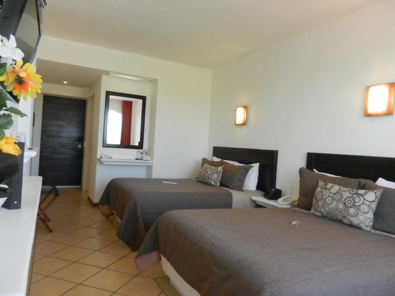Hotel 9 Manantiales تشيغناهوابان المظهر الخارجي الصورة