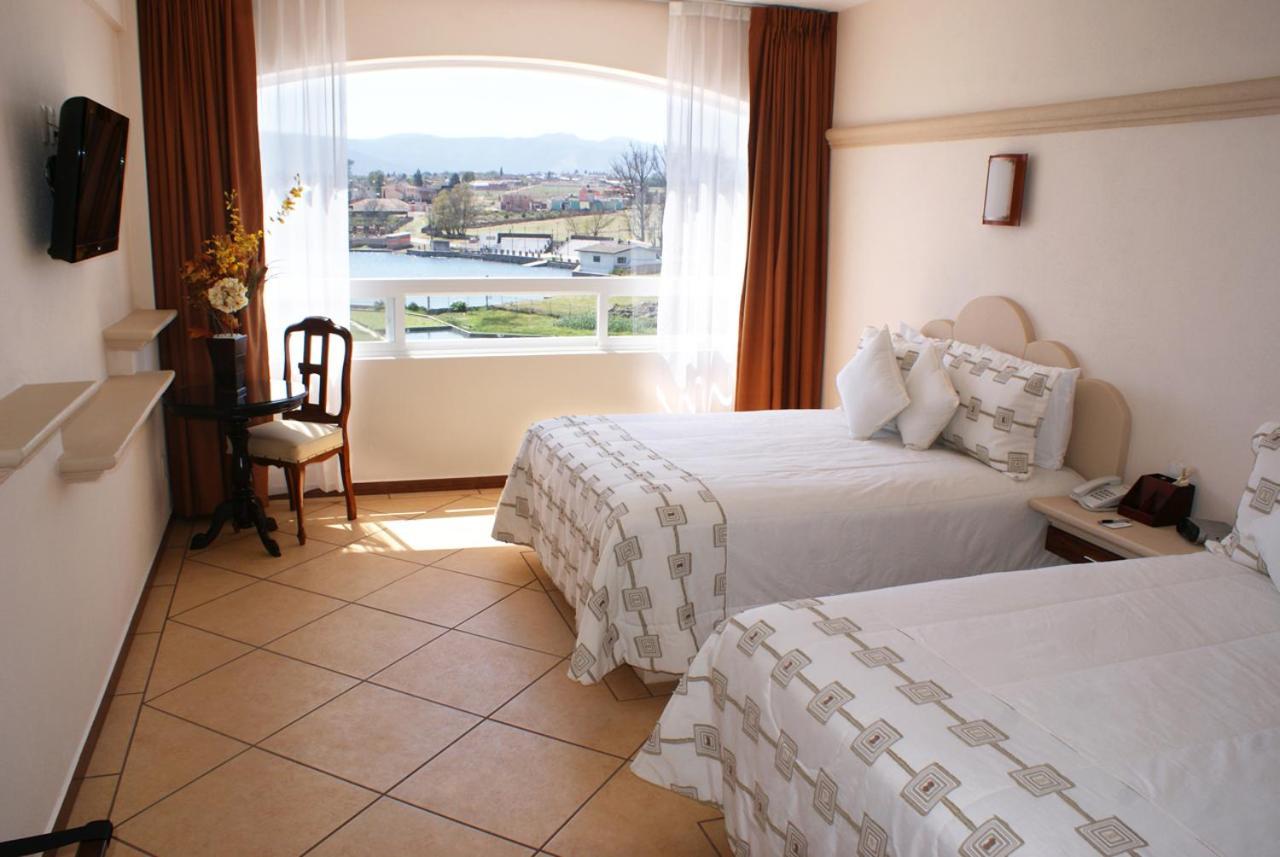 Hotel 9 Manantiales تشيغناهوابان المظهر الخارجي الصورة
