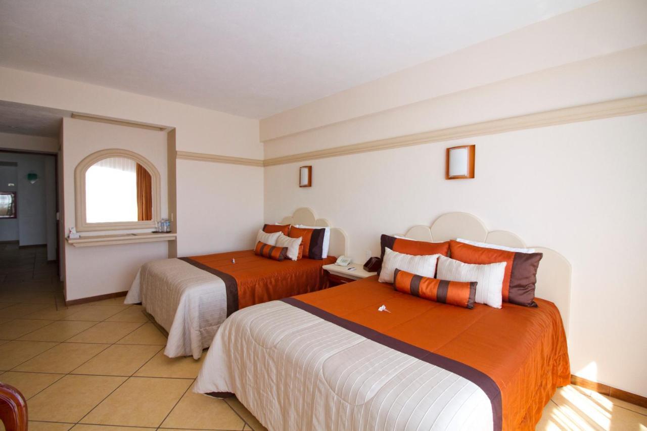 Hotel 9 Manantiales تشيغناهوابان المظهر الخارجي الصورة