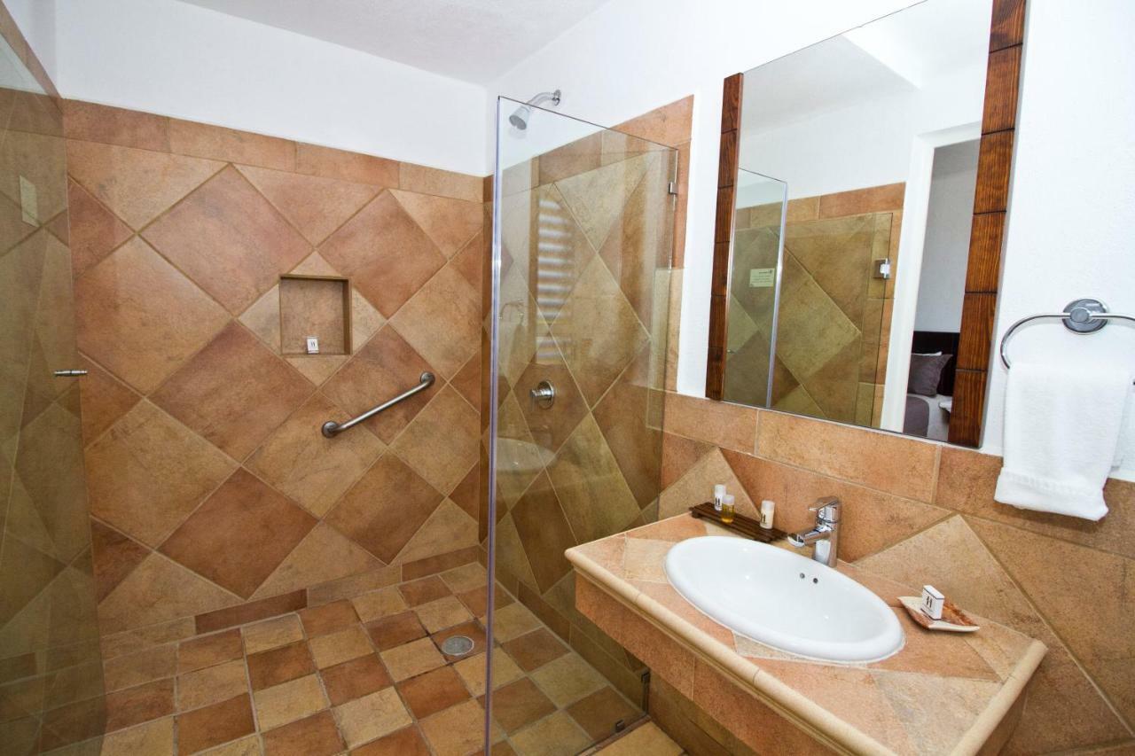 Hotel 9 Manantiales تشيغناهوابان المظهر الخارجي الصورة